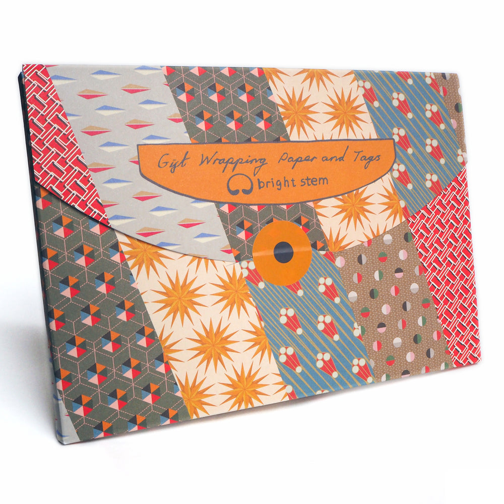 bright stem packaging folder for Recyclable Gift Wrapping Paper Geometric unique multicoloured designs Vintage Style Patterns. Stars sculptures, triangles hexagons. early 20th century, modernist, art deco style designs, ethically manufactured, made in the UK, recycled sustainable