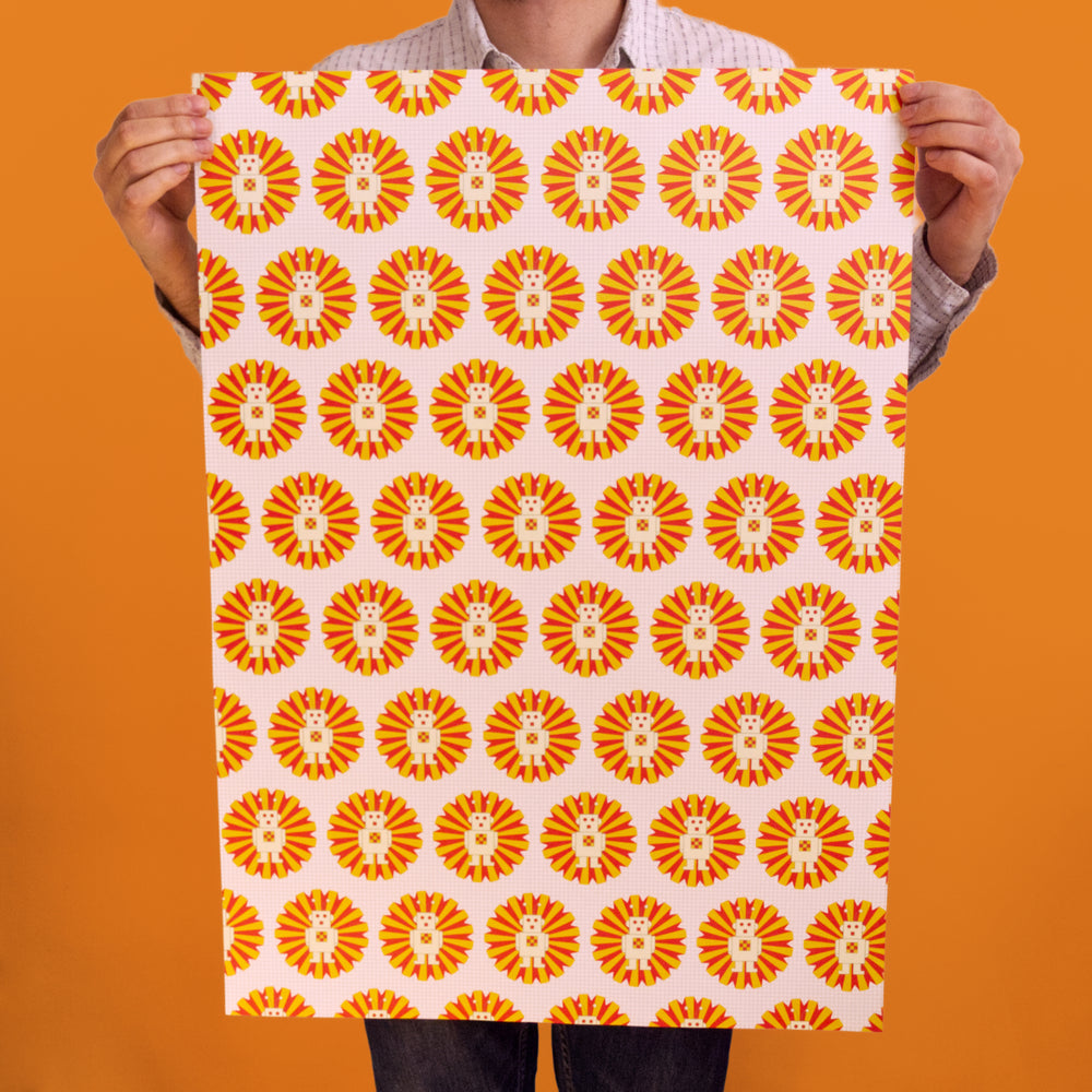 Bright Stem Kids wrapping paper. Sci-fi robot pattern. Held by artist and designer. Recyclable and made in the UK.