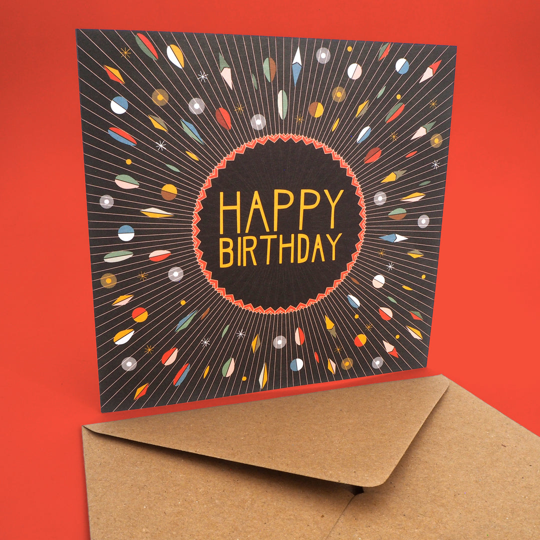 Bright Stem Recyclable Birthday card and envelope with colourful abstract design and 'Happy Birthday' text on a black background. Vintage style design inspired by art deco and bauhaus art school sold by the artist/ designer. Suitable for men or unisex.