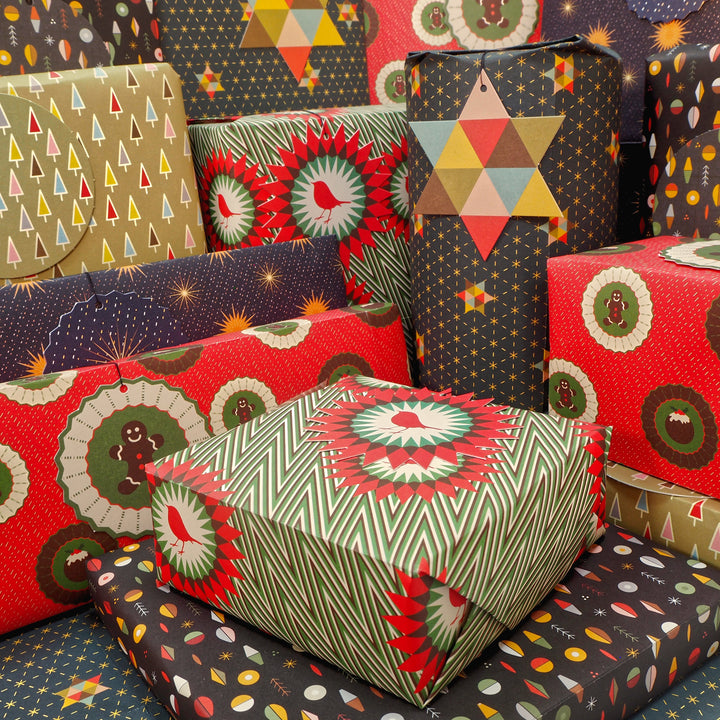 Presents wrapped with Bright Stem Recyclable Christmas Wrapping Paper Gift Wrap Folded (6) Sheets and Tags Mixed Pack .