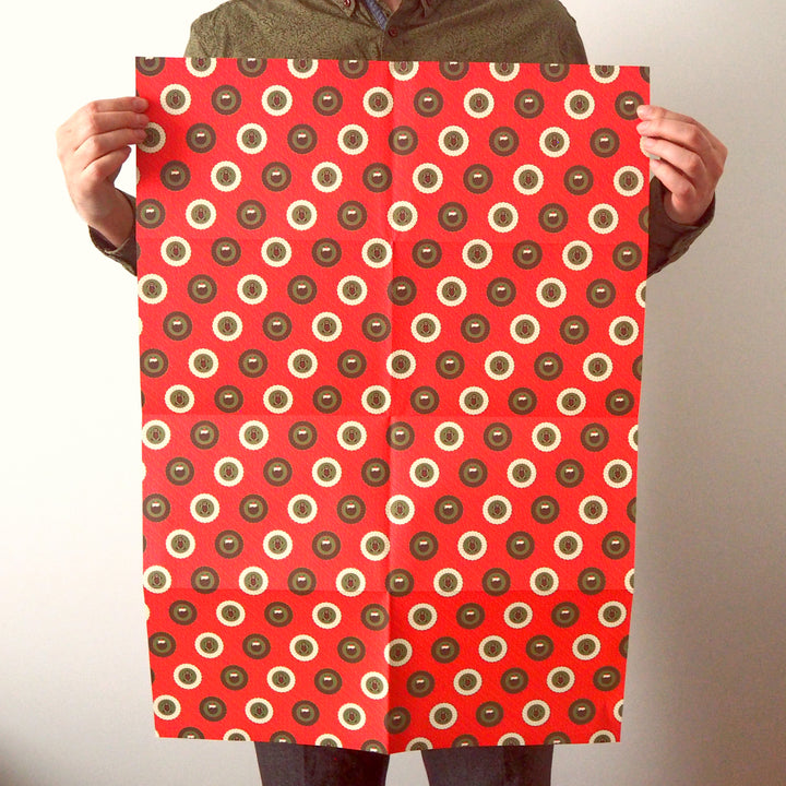 Bright Stem Recyclable Christmas Wrapping Paper Gift Wrap Folded ginger bread man and xmas pudding illustration pattern. held by Artist
