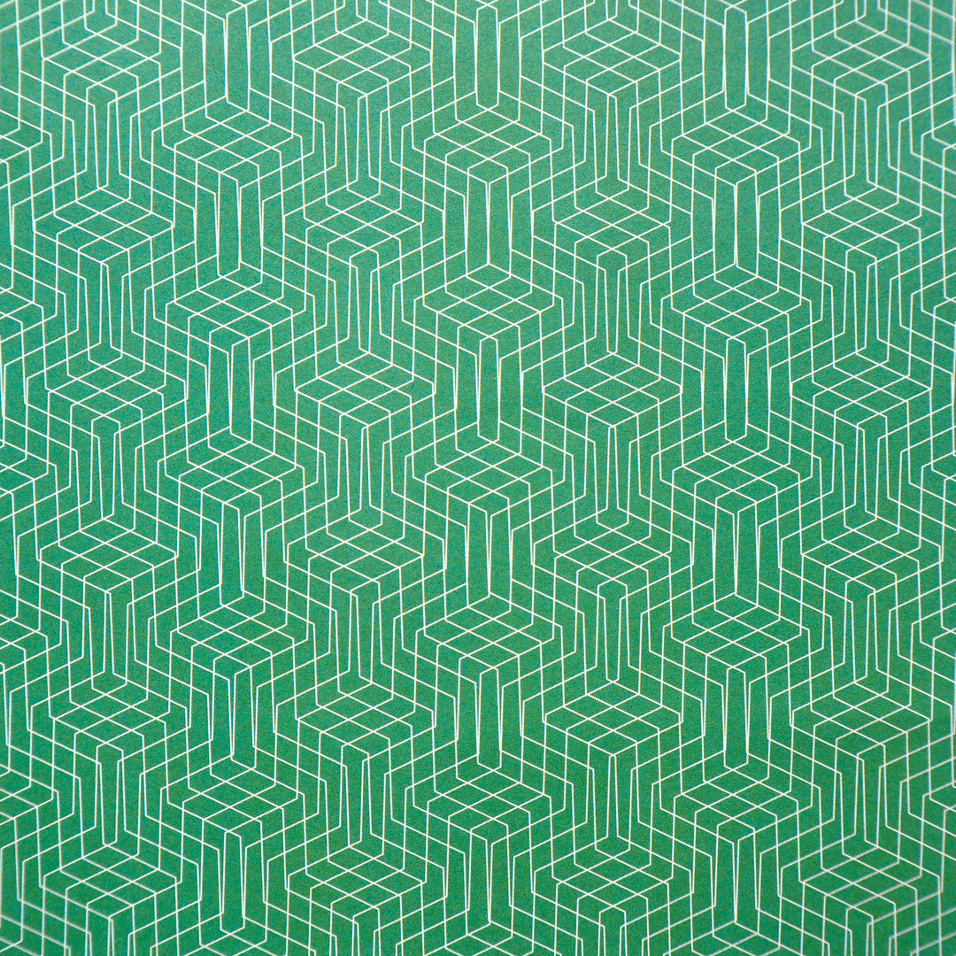Bright Stem recyclable wrapping paper. Geometric pattern with white lines on an emerald green background. Close up