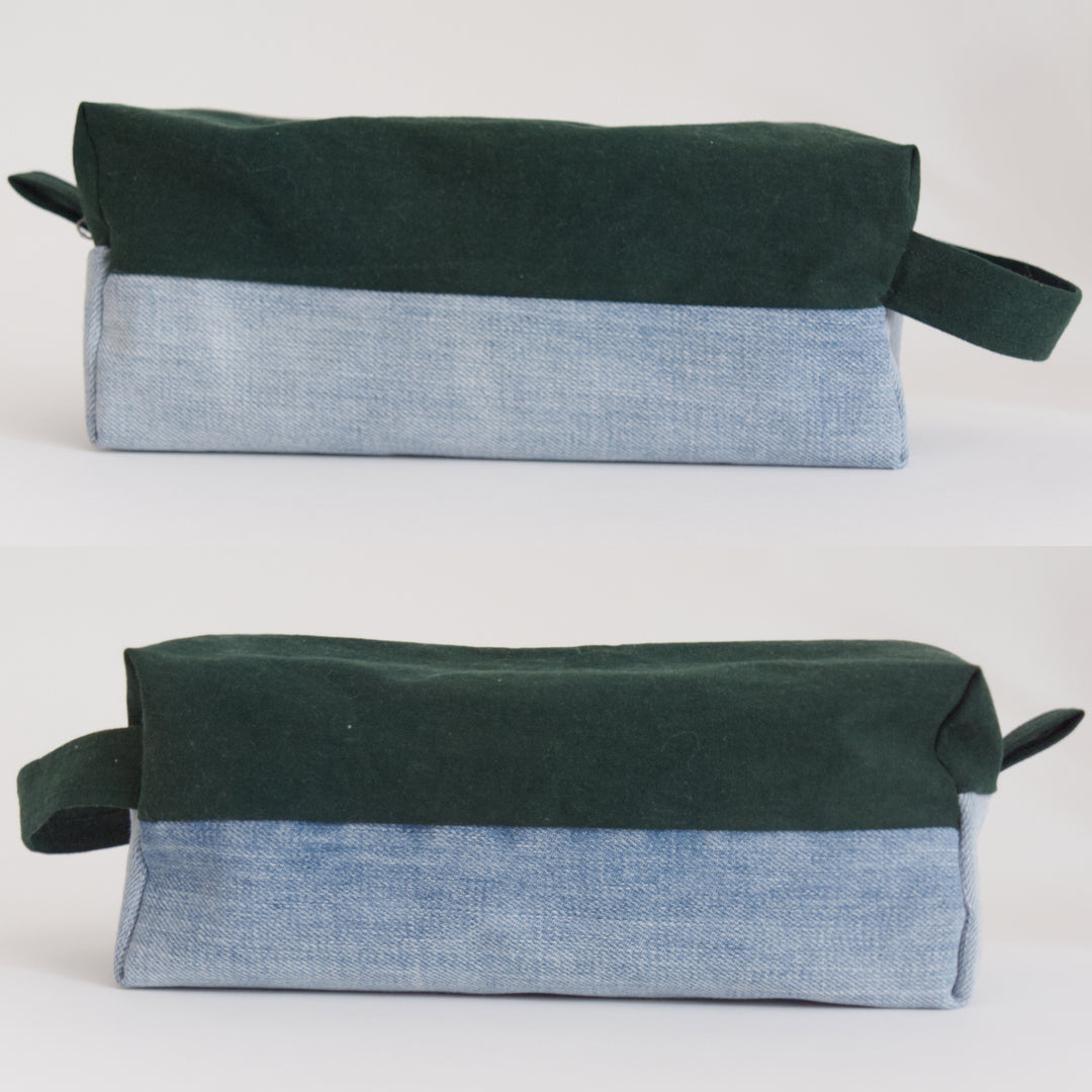 Bright Stem wash bag. two side views. made from green cotton and light blue denim upcycled fabric with a yellow and white cotton inner lining.