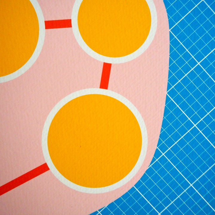 Close up of colourful abstract design with orangey yellow circles on a pink background and blue grid.