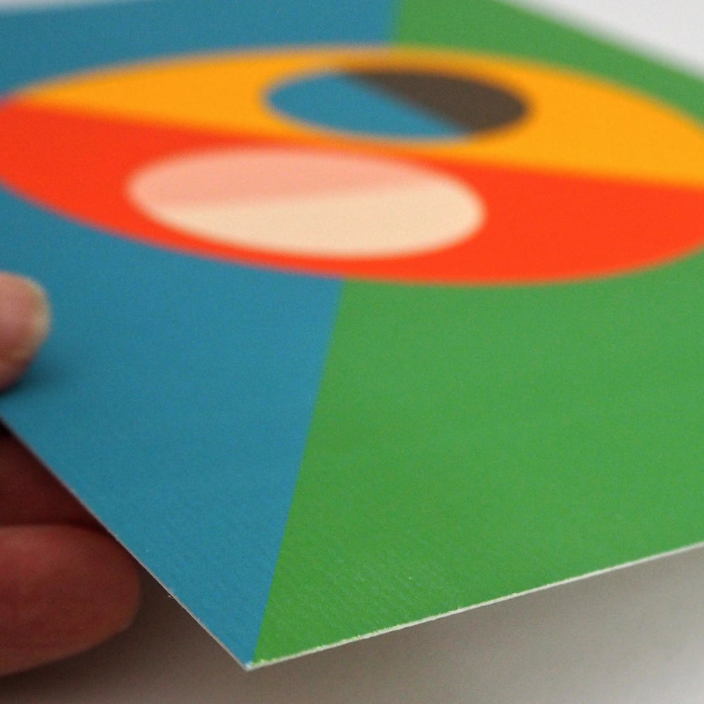 Artist holding a Contemporary Art Print  with Abstract Semi Circle Design printed on High Quality Watercolour Paper 240gsm