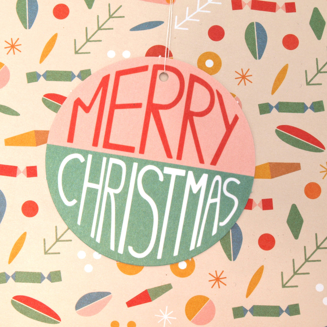 Decorative Christmas swing tag with 'Merry Christmas' text on a vintage style patterned background