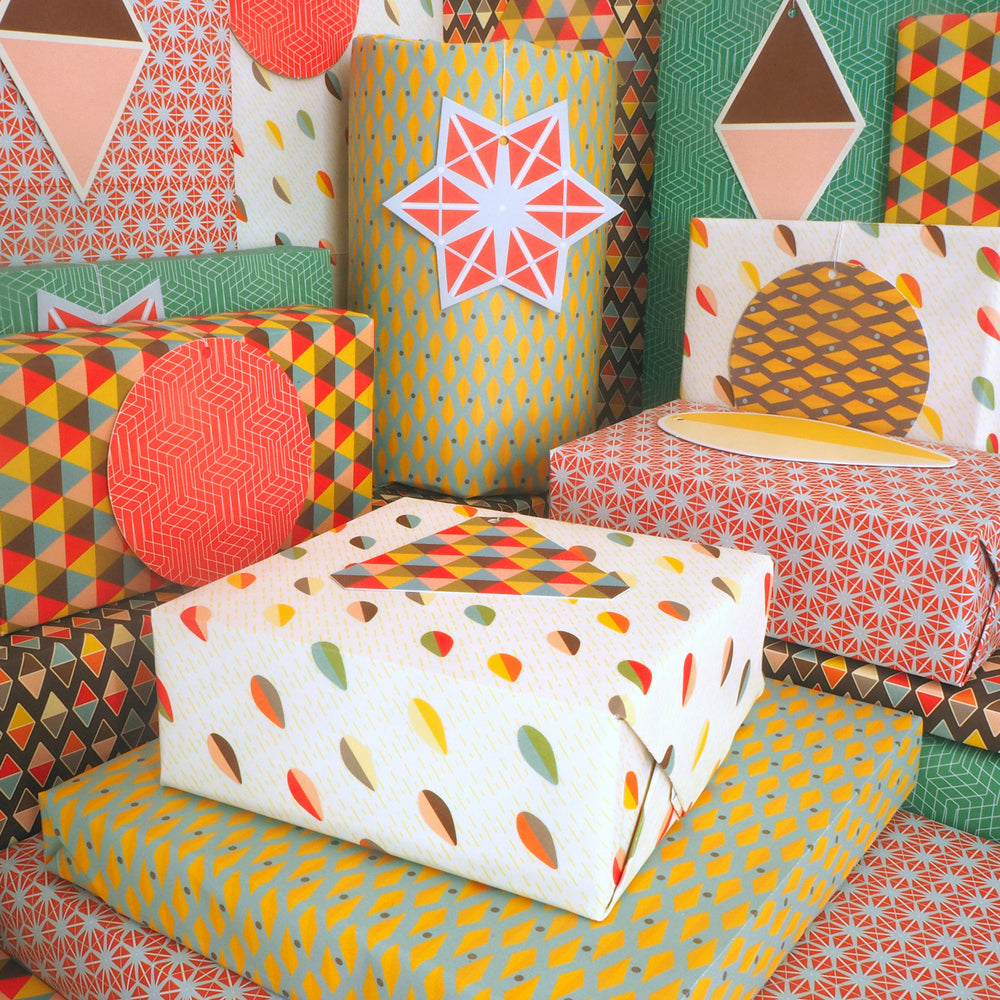 bright stem recyclable eco wrapping paper vintage style abstract geometric patterns gifts displayed recycled