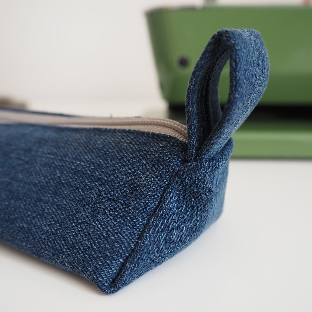Bright Stem Small Pencil Case made with Upcycled Denim and Organic Cotton with Orange Star Pattern for the Inner Lining.