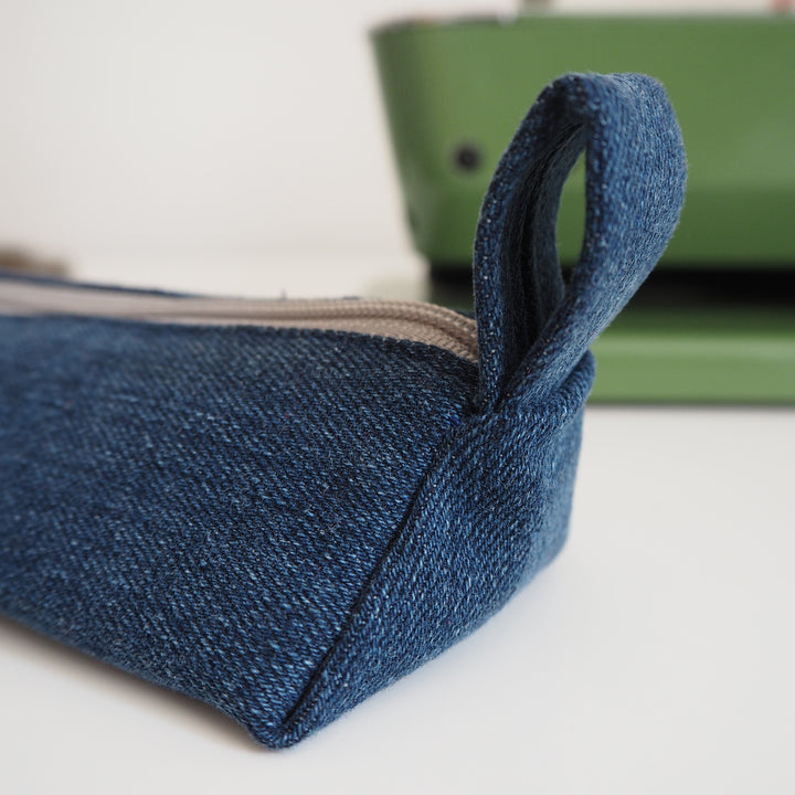 Bright Stem Small Pencil Case made with Upcycled Denim and Organic Cotton with Orange Star Pattern for the Inner Lining.