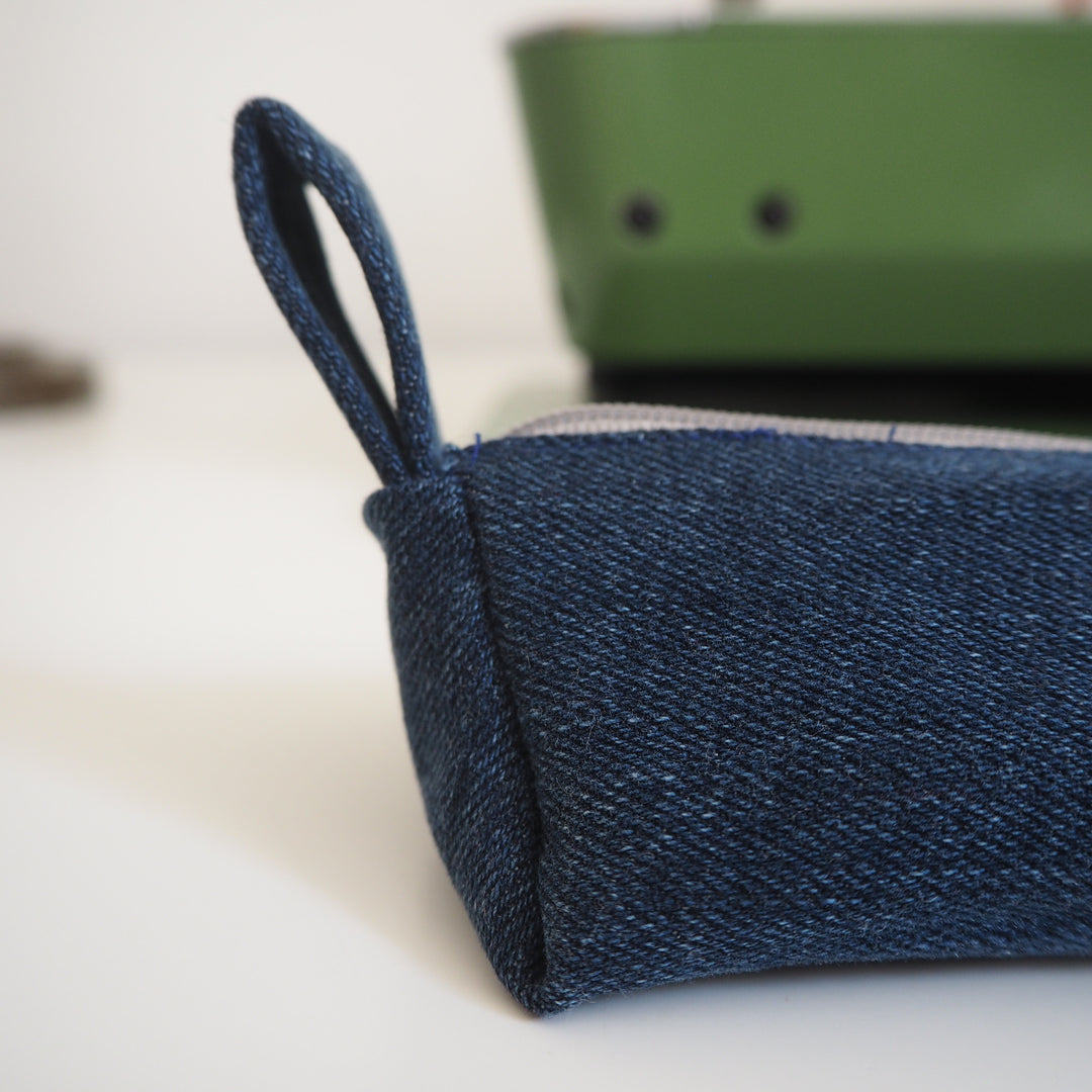 Bright Stem Small Pencil Case made with Upcycled Denim and Organic Cotton with Orange Star Pattern for the Inner Lining.