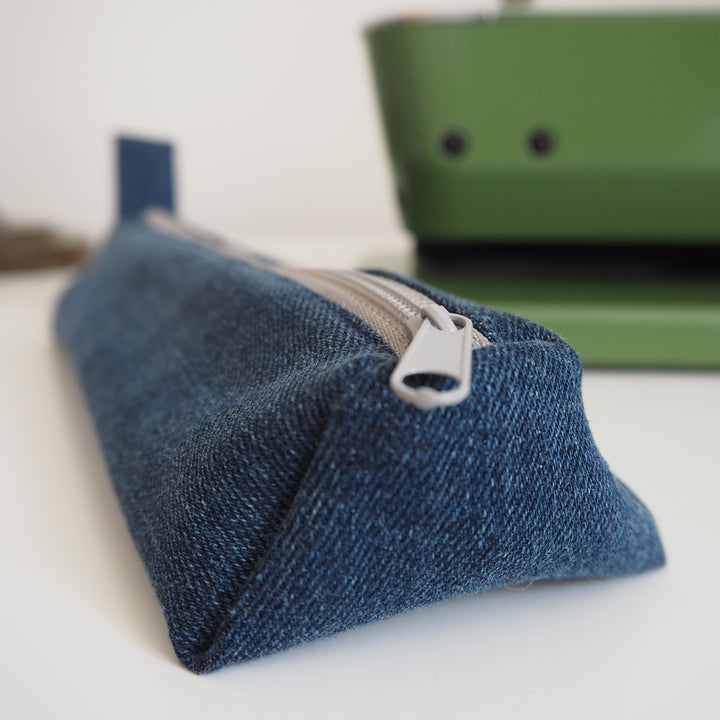 Bright Stem Small Pencil Case made with Upcycled Denim and Organic Cotton with Orange Star Pattern for the Inner Lining.