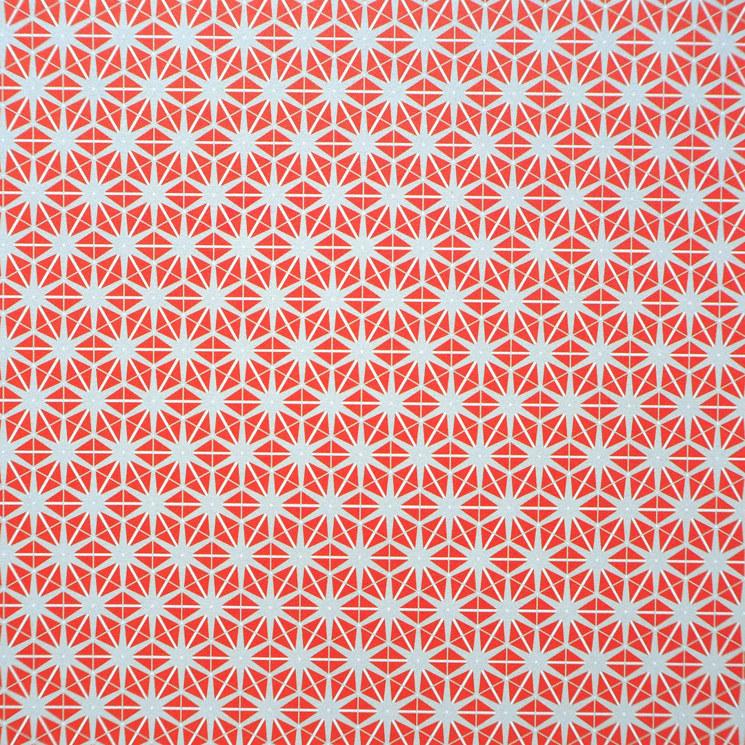 Recyclable Gift Wrapping Paper Featuring Orange and Grey Geometric Star Pattern