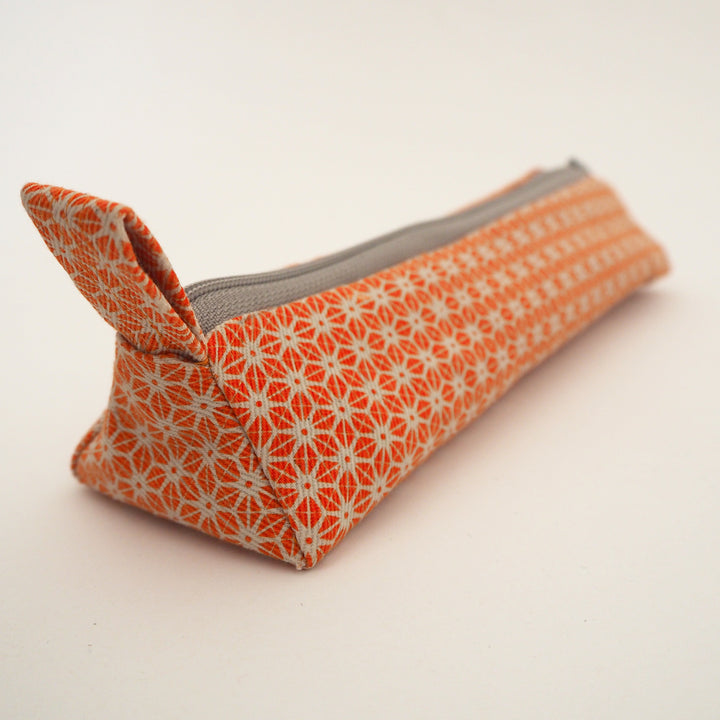 bright stem pencil case handmade with orange star pattern printed organic cotton and upcycled denim lining