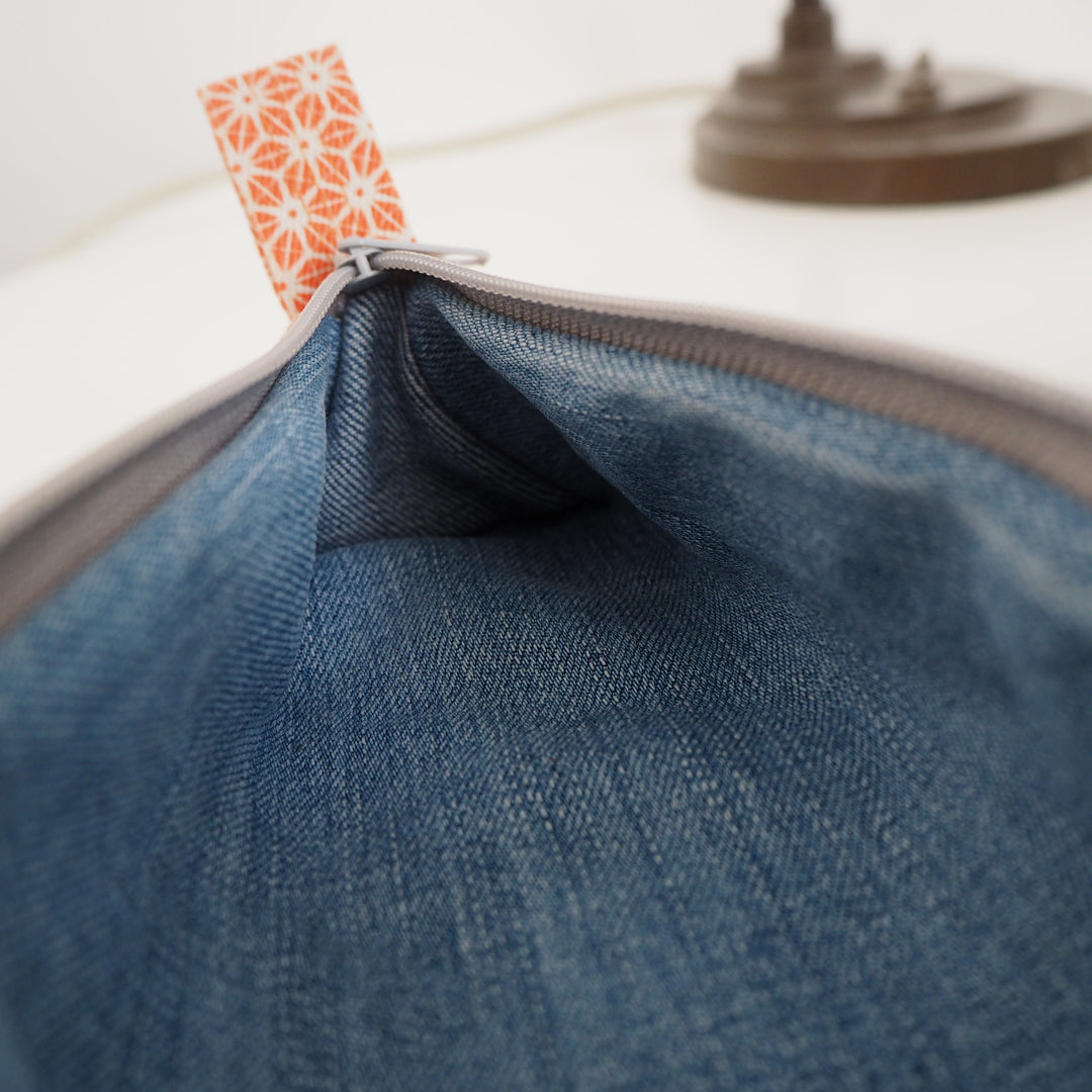 bright stem pencil case handmade with orange star pattern printed organic cotton and upcycled denim lining