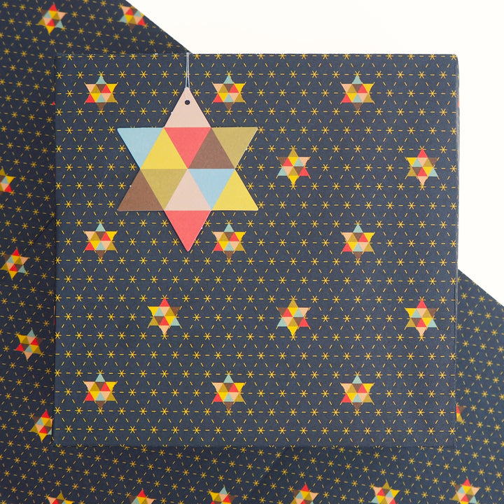 Recyclable Christmas Wrapping Paper Featuring Multicoloured Stars Geometric Star Pattern