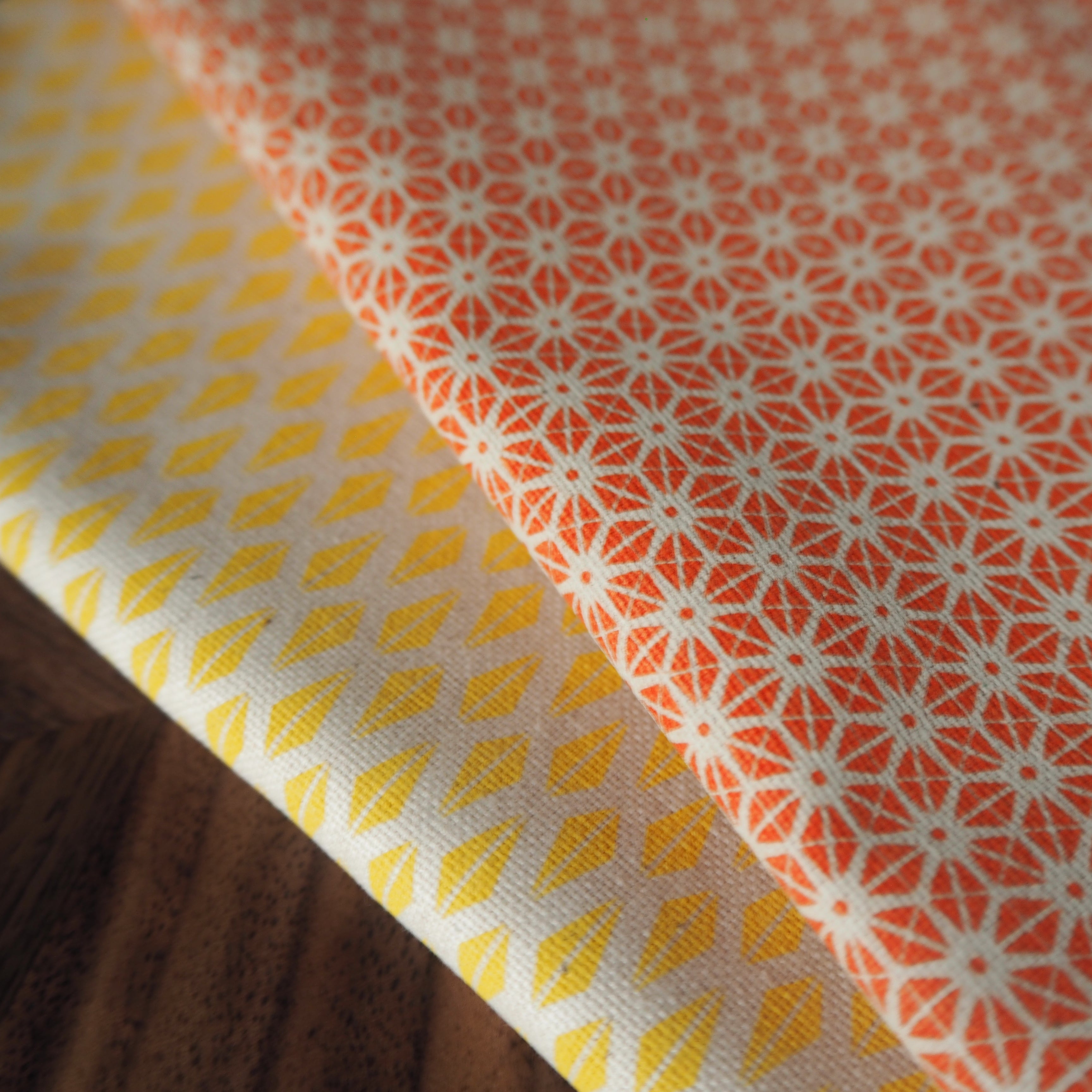 Bright Stem tea towels orange star and yellow triangle pattern 