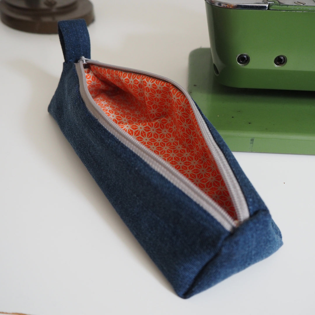 Bright Stem Small Pencil Case made with Upcycled Denim and Organic Cotton with Orange Star Pattern for the Inner Lining.