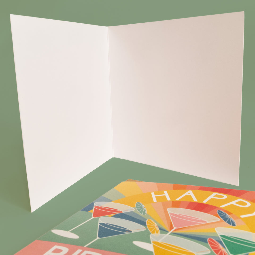 Square Birthday card blank inside on a green background with bright stem happy birthday card featuring cocktail drinks at the bottom