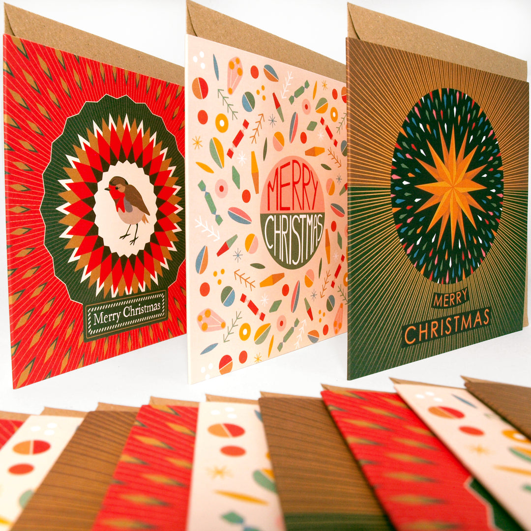Collection of colourful bright stem Christmas cards with various vintage style designs featuring abstract graphics illustrations of Robins and a yellow star. 