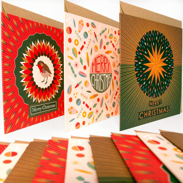 Collection of colourful bright stem Christmas cards with various vintage style designs featuring abstract graphics illustrations of Robins and a yellow star. 