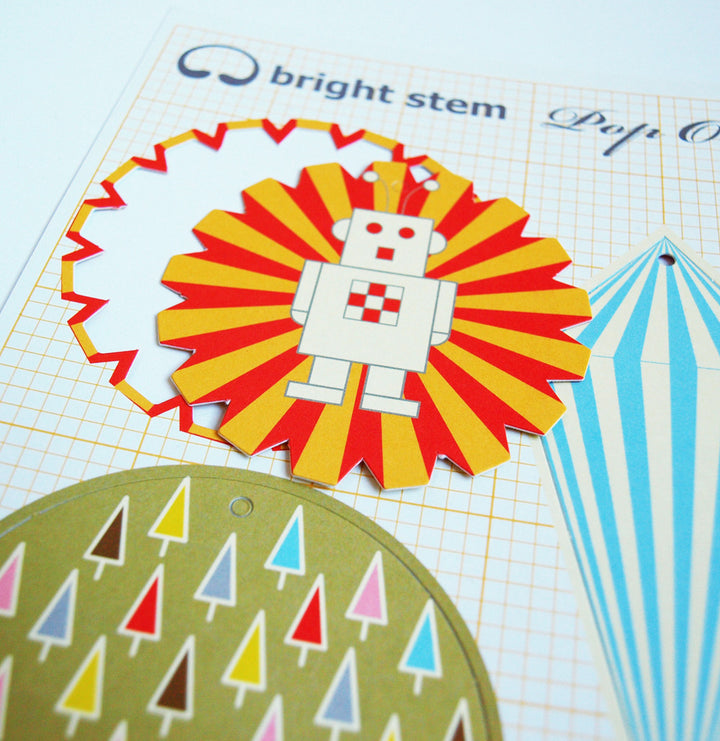 Bright Stem Christmas Decorations - Pop Out Bauble close up. Ray the Robot and christmas tree vintage style designs