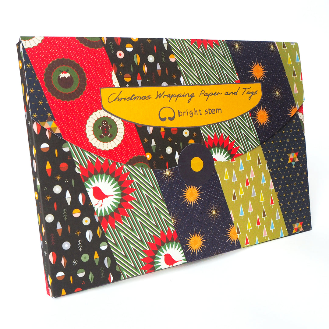 Plastic free packaging for Bright Stem Recyclable Christmas Wrapping Paper Gift Wrap Folded (6) Sheets and Tags Mixed Pack. Recycled cardboard folder 